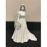 A Coalport commemorative figure - The Queen,