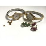 A box of two pairs of 9ct gold earrings together with two Lady's Rotary wrist watches and a small