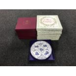 Six boxed Royal Doulton Christmas collector's plates together with a further six boxed Royal