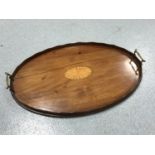 A Victorian inlaid mahogany gallery tray with brass handles