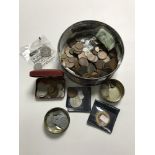 A tin containing a quantity of pre-decimal British coins, Foreign coins, commemorative coins,