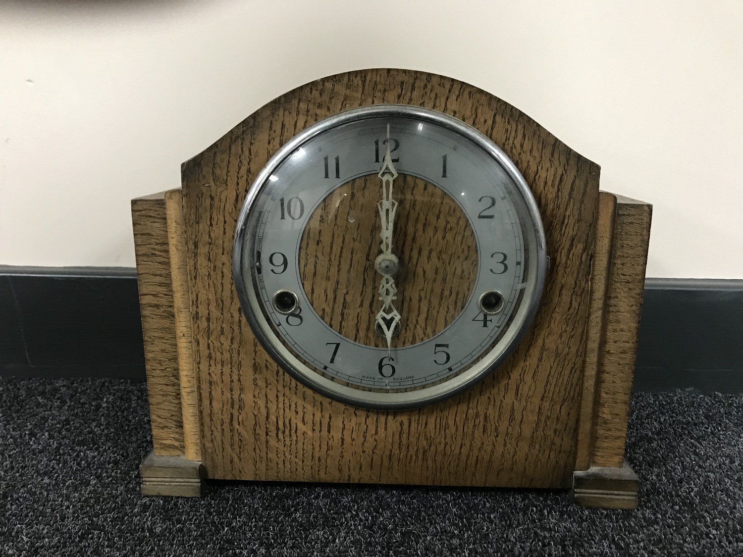 An oak cased Enfield mantel clock