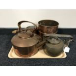 A tray of vintage copper kettles,