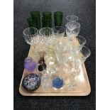 A tray of wine glasses, green glass champagne flutes, Caithness vase,