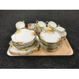 A thirty seven piece Royal Paragon china tea set