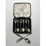 A set of six cased Northern Goldsmiths silver spoons,