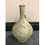 A La Rambla unglazed earthenware vase with slip-trailed decoration in relief with impressed marks,