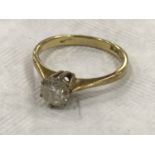 An 18ct gold diamond solitaire ring, approximately 0.