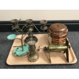 A tray of trench art money box, a miner's lamp, an enamelled ring stand,