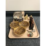 A tray of Thornton's limited edition money box, a lion figure on plinth, Chinese foo dog ornaments,