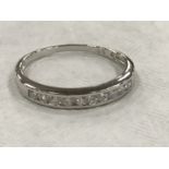 A silver cz half eternity dress ring