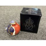 A boxed Royal Crown Derby china paperweight,