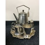 A plated spirit kettle on stand, three tankards,