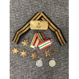 A collection of seven Second World War medals with ribbons including Italy star, Atlantic star,