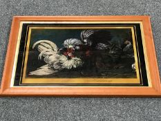 A framed painting on glass depicting cockfighting