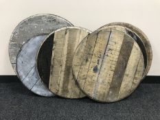 Seven oak whiskey barrel lids