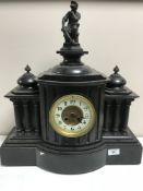 A Victorian slate mantle clock with gilt and enamel dial