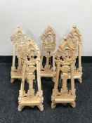Five carved miniature easiels