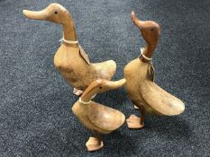 Three wooden duck figures