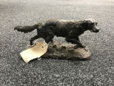 A bronze figure of a Setter CONDITION REPORT: This measures 20.5cm long, 9.