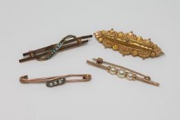 Four various gold brooches, 7.
