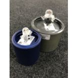 Two boxed Swarovski Crystal snowmen figures.