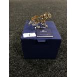 A boxed Swarovski Crystal Society figure, Lion Cub Standing, with certificate.