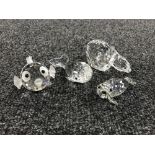 Four un-boxed Swarovski Crystal figures; polar bear, seal,