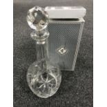 A boxed lead crystal decanter