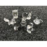 Seven un-boxed Swarovski Crystal figures; owl, snail, two rabbits, fox,