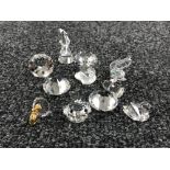 Ten un-boxed miniature Swarovski Crystal figures; pelican bird, prisms,