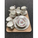 A tray containing a twenty one piece Dutchess Nanking china tea service,