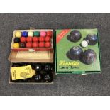 A set of boxed Henselite lawn bowls together with a set of boxed Banda carpet bowls and a set of