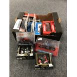 A box containing assorted boxed die cast motorbikes