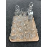 A tray of assorted glassware including Bohemian crystal decanter, etched glass decanter,