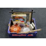 A box containing a set of brass stair rods, carnival glass bowls, vintage party games,