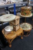 Two gilt and marble effect plant tables, together with two bamboo and wicker tables,