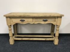 A reclaimed pine kitchen prep table with drawers