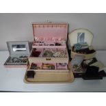 A tray containing jewellery boxes, assorted costume jewellery, compacts,