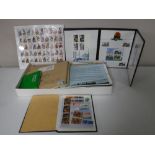 A box containing assorted stamps of the world including, Royal Family, first day covers,