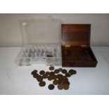 Two containers containing British pre decimal coinage, mainly one penny and half penny pieces,