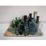 A tray containing vintage bottles