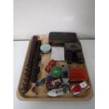 A tray containing a policeman's truncheon, a Nikko sterling air rifle scope, air rifle pellets,