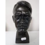 A cast metal bust of Hitler