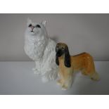 A Beswick figure of an Afghan hound, together with a Beswick figure of a cat,