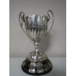 A sterling silver twin handled trophy, 'Pearl Life Assurance Co Challenge Cup', 441g,