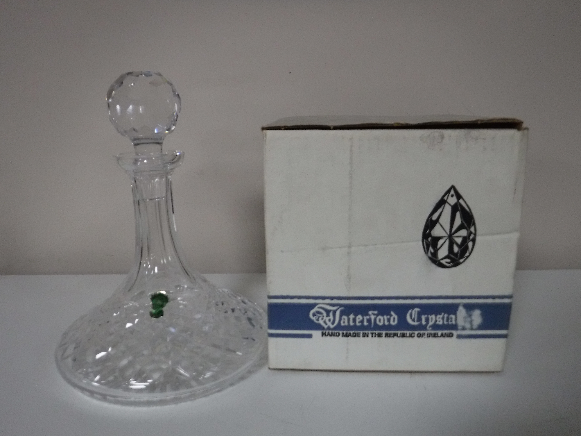 A boxed Waterford Crystal ships decanter