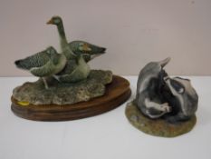 A Border Fine Arts figure of three geese on wooden plinth,