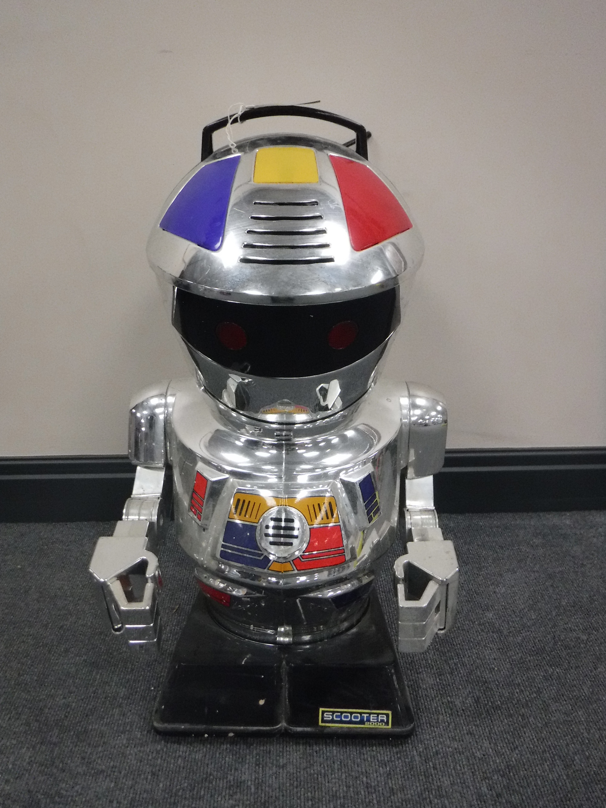 A vintage Scooter 2000 toy robot