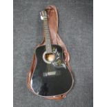 A Korean Hondo model H124BHM acoustic guitar with carry bag